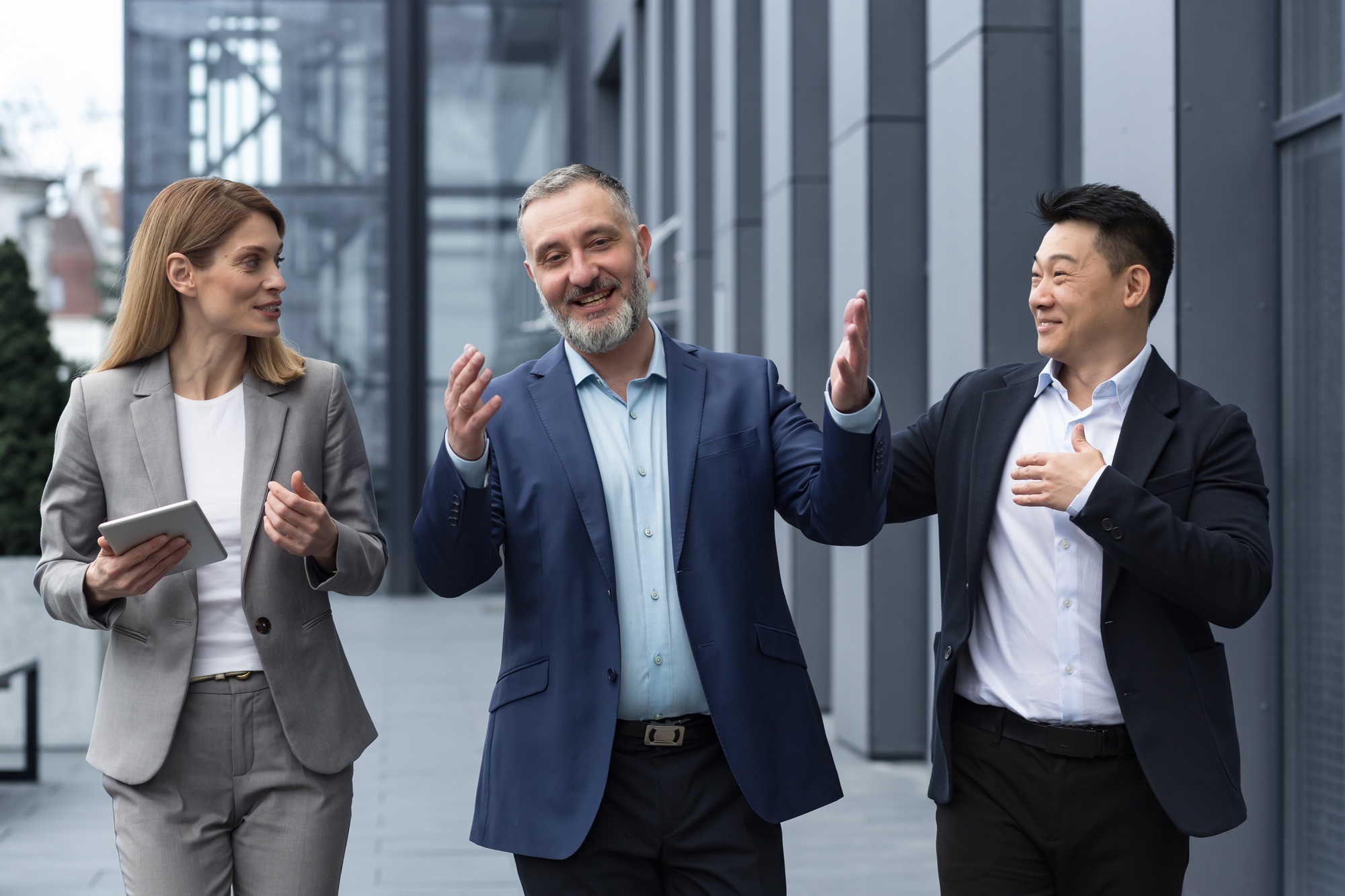 A diverse team of IT specialists, senior and experienced engineers managers team leaders, a group of
